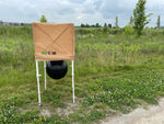The Fly Cage deer fly and greenhead trap set up near marsh wetland area – chemical-free biting fly control for yards and properties