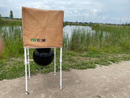 Fly Cage horse fly trap set up outdoors near pond and walking trail
